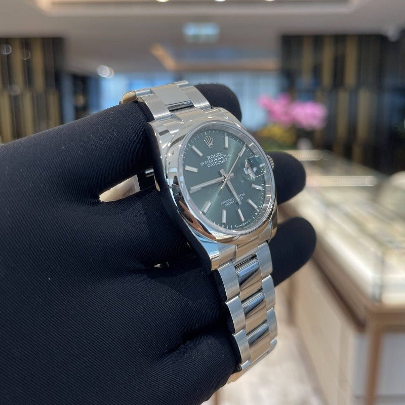 Rolex 126300 Green Oys Datejust- Aristo Watch & Jewellery